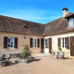 a picture of an authentic stone character house in France